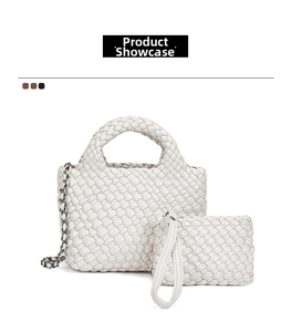 Detail view of white woven bucket bag set including small zipper pouch and chain strap