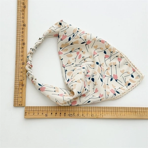 Floral fabric headscarf with cream lace edge and pink heart pattern detail view