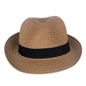 Detail of straw hat weave texture with black ribbon band on a summer fedora sun hat