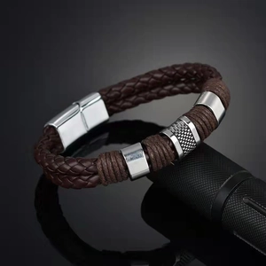 Brown braided leather bracelet with silver magnetic clasp and cross elements for men