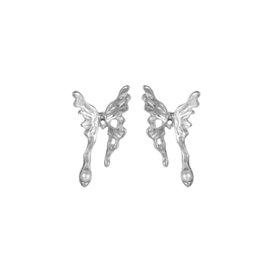 Artistic liquid metal butterfly drop earrings with white pearl details on white background
