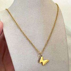 Elegant gold double-layered butterfly pendant necklace with refined O-shaped link chain