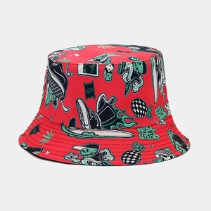 Detail of red graffiti bucket hat with street art patterns and Feel Wide print