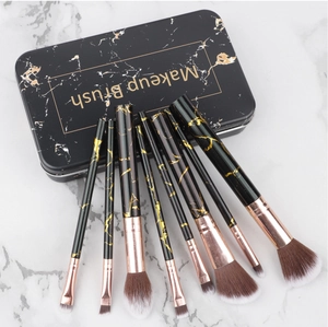 Detail of 8pcs marble pattern makeup brushes with rose gold ferrules in a metal storage box