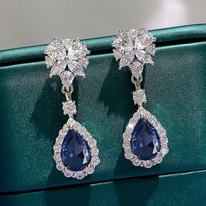 Elegant floral drop earrings with deep blue water drop stones and white zircon details