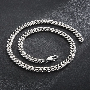 Detailed view of silver stainless steel Cuban link necklace with a lobster clasp