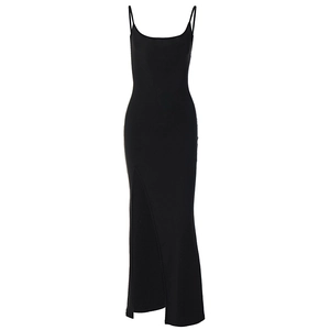 Detail view of black lace mesh bodycon dress featuring a high side slit and slim fit style