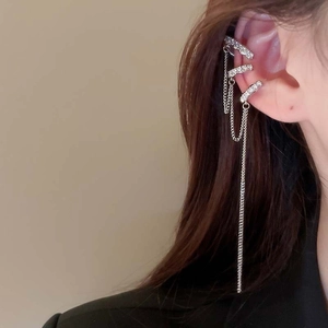 Elegant silver-toned tassel earrings with shimmering rhinestones for a sophisticated look.