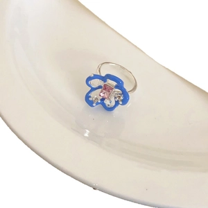 Silver hollow flower ring with blue enamel, pink gemstone, and diamonds for women