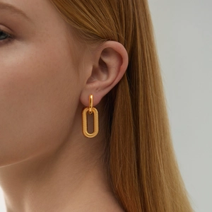 Fashionable 18K gold-plated oval hoop earrings with textured spiral design for women
