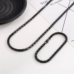 Detail of 5mm black box chain necklace and bracelet set with secure lobster clasp