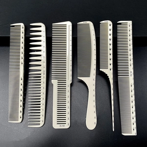 Set of 6 beige professional barber combs with integrated scale and model markers