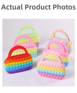Set of colorful heart-shaped pop-it silicone handbags in six vibrant rainbow colorways