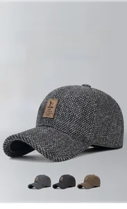 Detail of men's winter baseball cap showing foldable earflaps and thick fleece lining