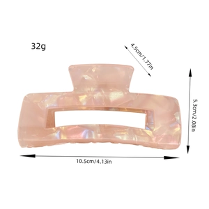 Pink iridescent marble hair claw clip measuring 10.5cm and weighing 32g for women