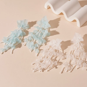 Elegant acrylic leaf fringe drop earrings in light blue and white for women