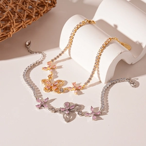 Elegant butterfly charm bracelet with pink cubic zirconia and pavé chain for women