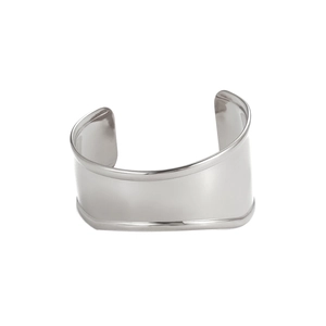 Macro detail of high-polish silver wide-band cuff bracelet in minimalist steel