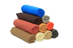 Detail of rolled mercerized cotton jersey headscarves in multiple autumn colors