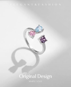 Detail of S925 silver open ring with pink, blue, and purple colorful gemstones
