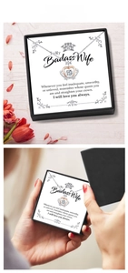 Detailed crown necklace with dancing diamond pendant and romantic gift card in a box
