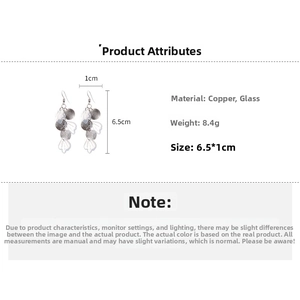 Detail view of long tassel earrings in silver copper with glass petals and measurements