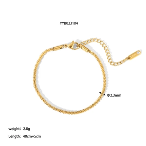 Close-up of 18K gold-plated stainless steel chain with lobster clasp and S.steel tag