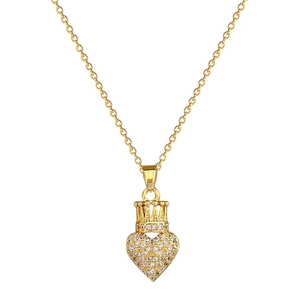Luxurious gold-tone crown heart pendant necklace featuring sparkling crystals on white background
