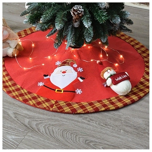 Detail of Santa and Snowman plush embroidery on a red checkered Christmas tree skirt
