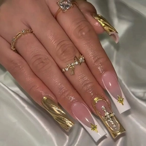Handmade long square French press-on nails with gold cross and star rhinestone charms