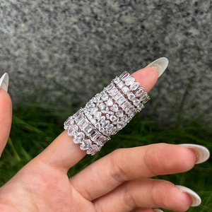 Elegant S925 sterling silver rings with geometric zircons worn in stacked style