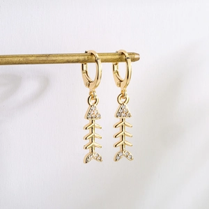 Pair of 18K gold plated fishbone hoop earrings with shimmering cubic zirconia accents