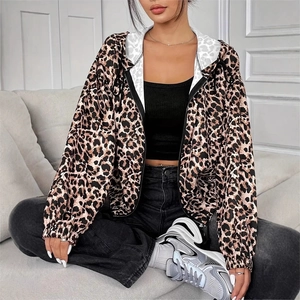 Detail view of leopard print hooded jacket with zipper closure and drawstring design