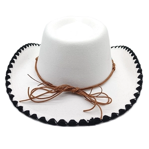 Detail of white felt cowboy hat featuring black stitched edges and a thin brown rope band
