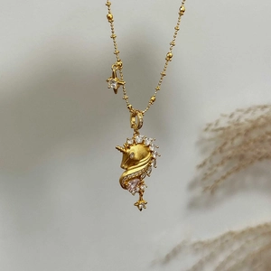 18k gold plated unicorn pendant necklace with sparkling zircons and a small star charm