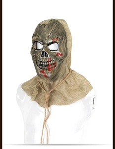 Detailed view of burlap scarecrow skull mask with realistic red blood splatters and rope
