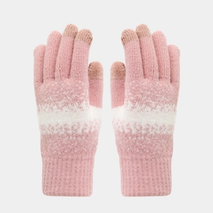 Close-up of pink knitted touchscreen gloves with snowflake patterns and ribbed cuffs