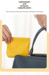 Bright yellow PU leather mini makeup pouch with squeeze closure and gold lettering