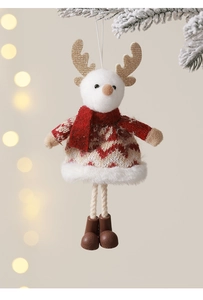 Close-up of plush Christmas reindeer ornament with gold sequins and soft knit details