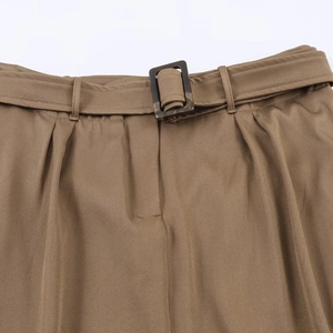Brown high-waisted casual skirt with matching belt and tortoise shell buckle