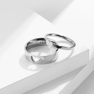 Polished stainless steel couple rings with heart cut-out and I LOVE YOU engraving