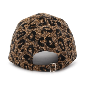 Detail of leopard print baseball cap featuring silver metal buckle and textured fabric