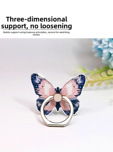Macro detail of butterfly phone ring holder in acrylic showing stable desktop stand function