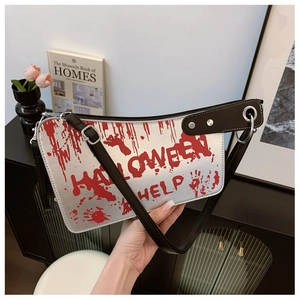 Detail of silver cleaver bag with red blood splatters and Halloween Help text print