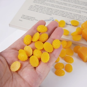 Miniature 1.5cm yellow mango resin pellets for DIY crafts and realistic food models