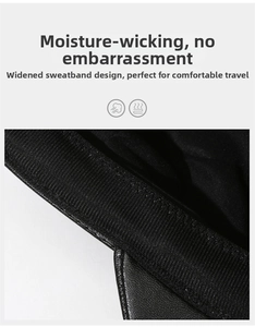 Detail view of the black newsboy hat showing the widened sweatband with breathable fabric
