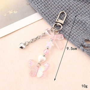 Pink acrylic bow keychain with heart and star charms, resin bead bag accessory, 9.5cm length