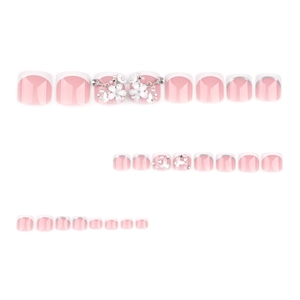 French press-on toenails with white flowers pearls and rhinestones on pink base