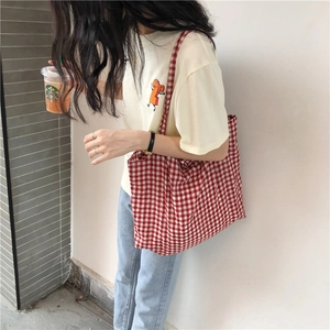 Close-up of red and white checkered canvas tote bag with large capacity for women