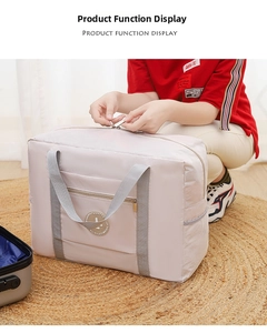 Detail of travel bag showing sturdy zippers and suitcase handle strap for easy attachment